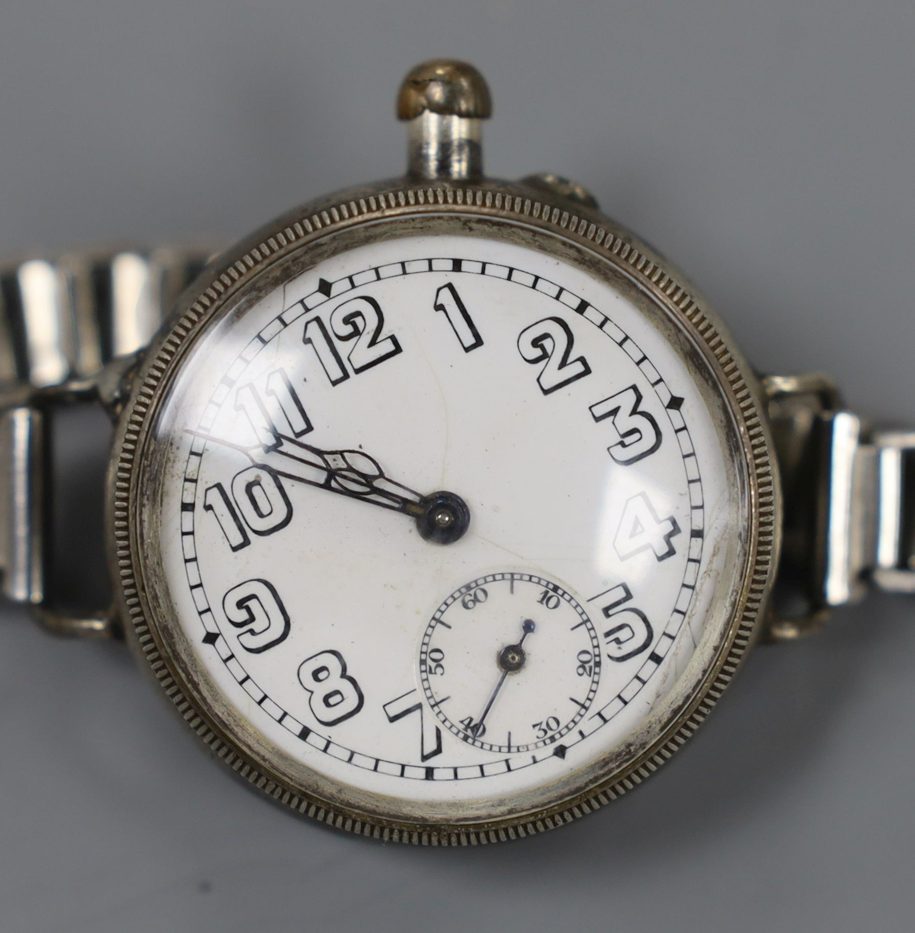 A gentleman's early 20th century silver Borgel cased manual wind wrist watch, on a metal bracelet.